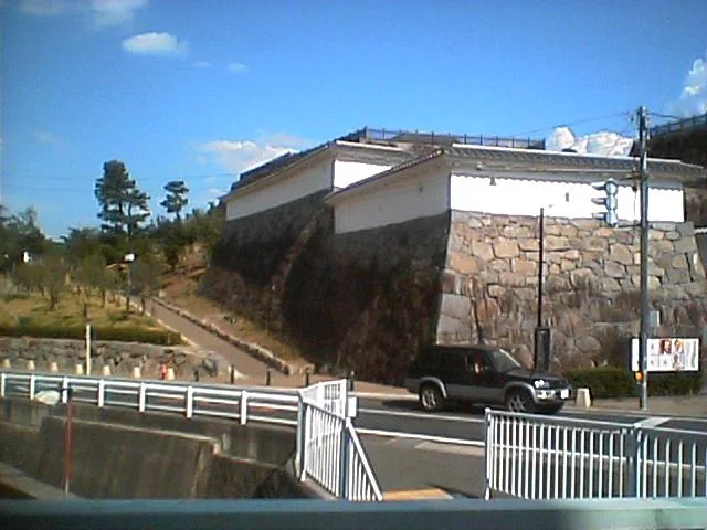 A turret and stone walls at Kofu Castle