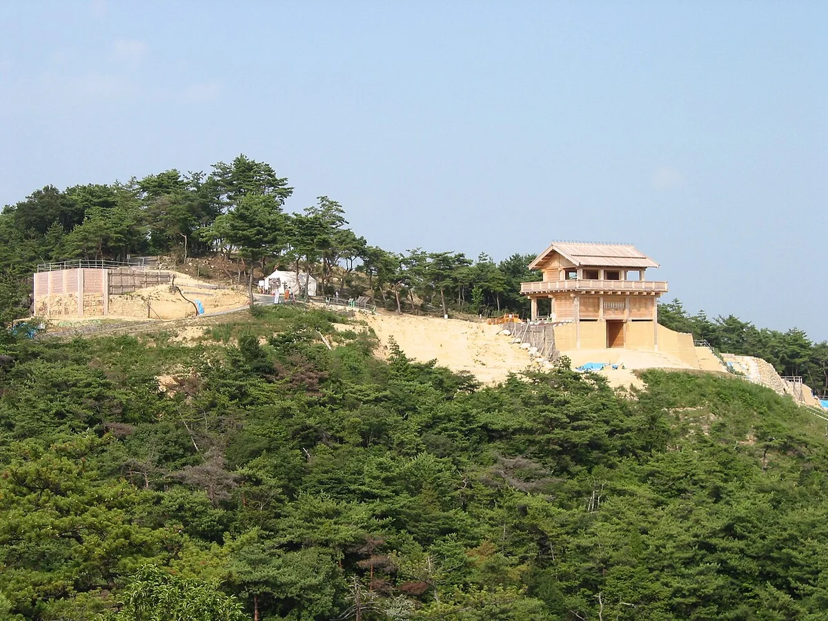 The reconstructed West Gate and walls of Kinojo on its hilltop