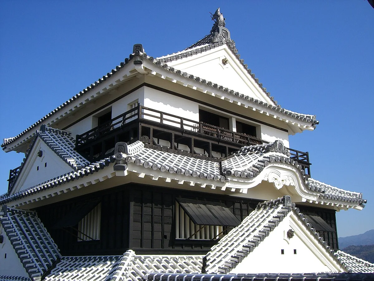 A close view looking up at Matsuyama Castle keep